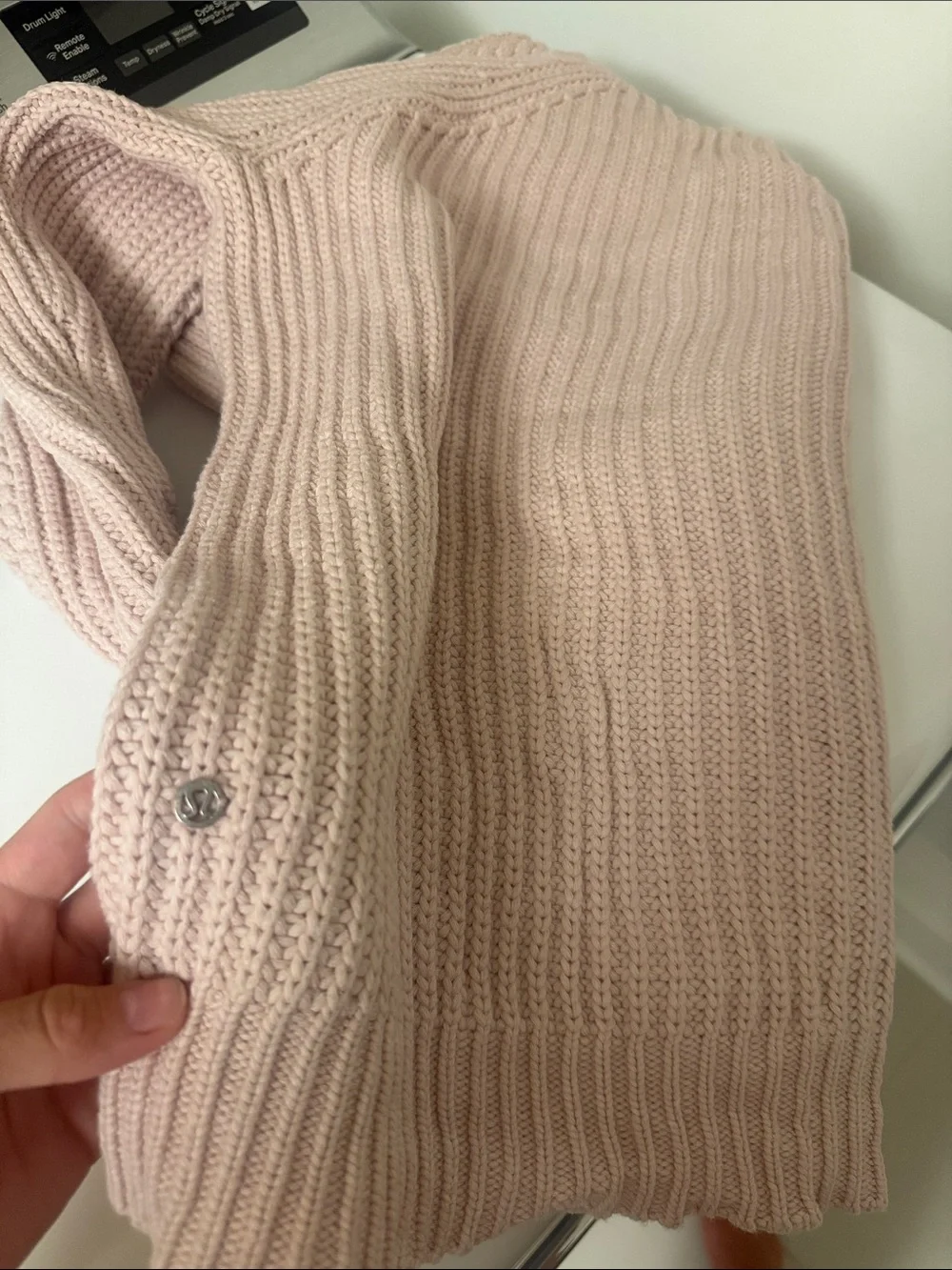Lululemon Bring The Cozy Turtleneck in a soft misty pink cable knit